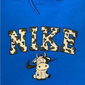 Nike cow hoodie or crewneck